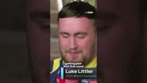 Luke Littler reacts to facing Darius Labanauskas in the first round at the World Darts Championship